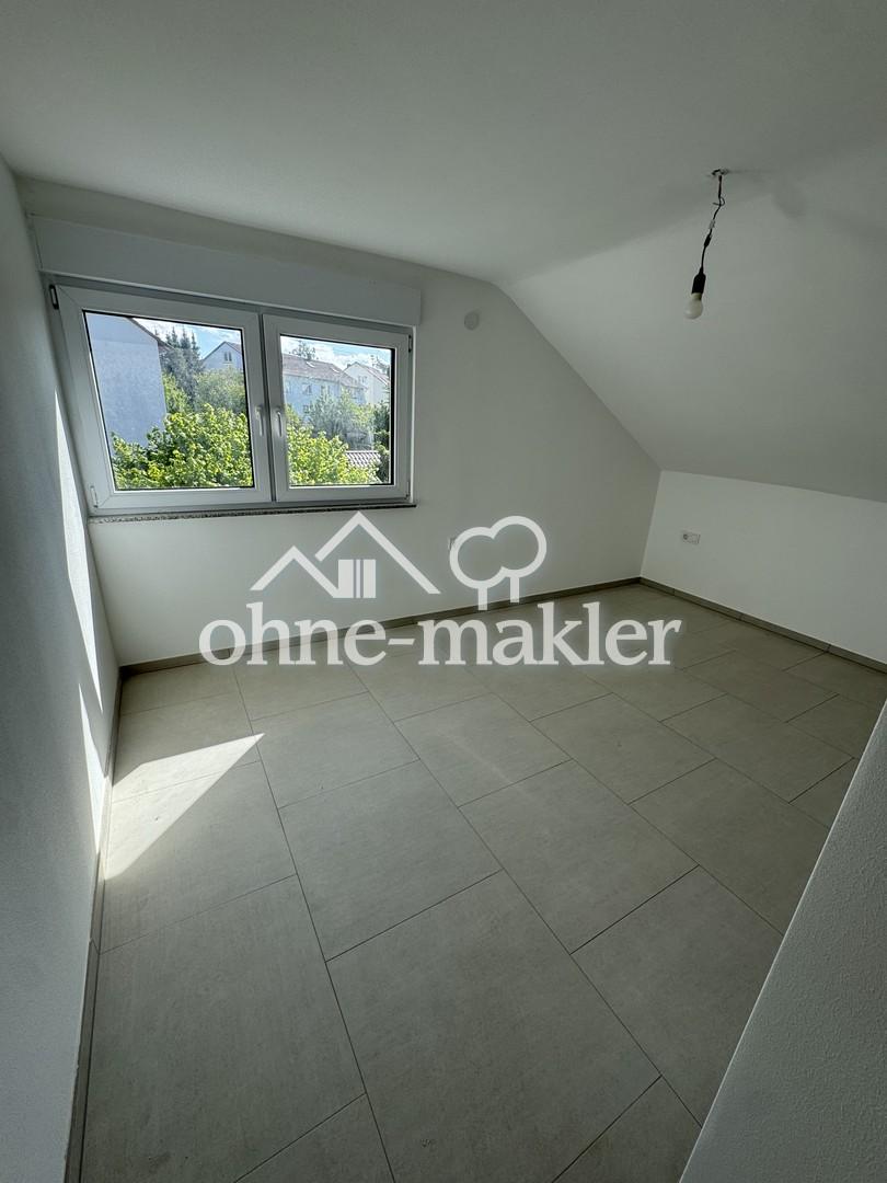 Erstbezug nach Kernsanierung: Moderne 3-Zimmer-Dachgeschosswohnung mit neuer Einbauküche - Foto 5