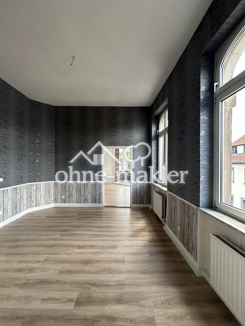 Wohnen mit Geschichte – Charmante Altbauwohnung im denkmalgeschützten Ensemble - Photo 5