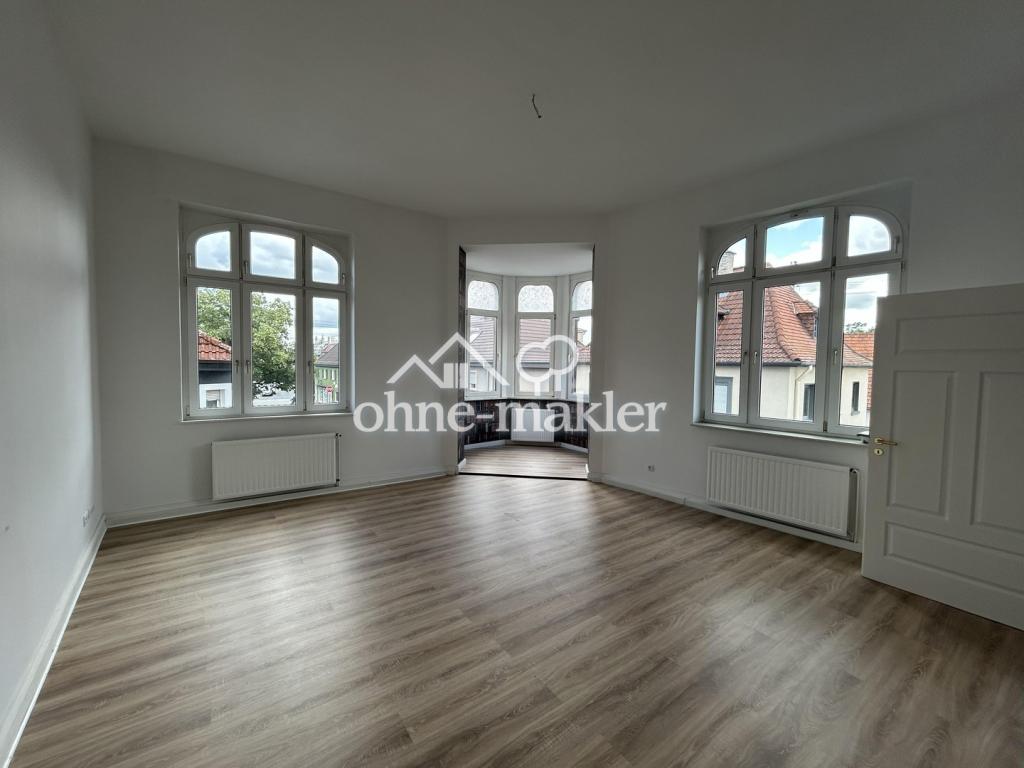Wohnen mit Geschichte – Charmante Altbauwohnung im denkmalgeschützten Ensemble - Photo 2