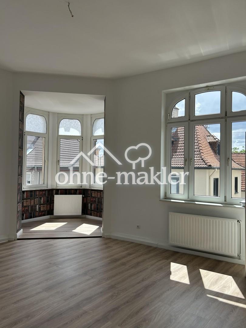 Wohnen mit Geschichte – Charmante Altbauwohnung im denkmalgeschützten Ensemble - Photo 3