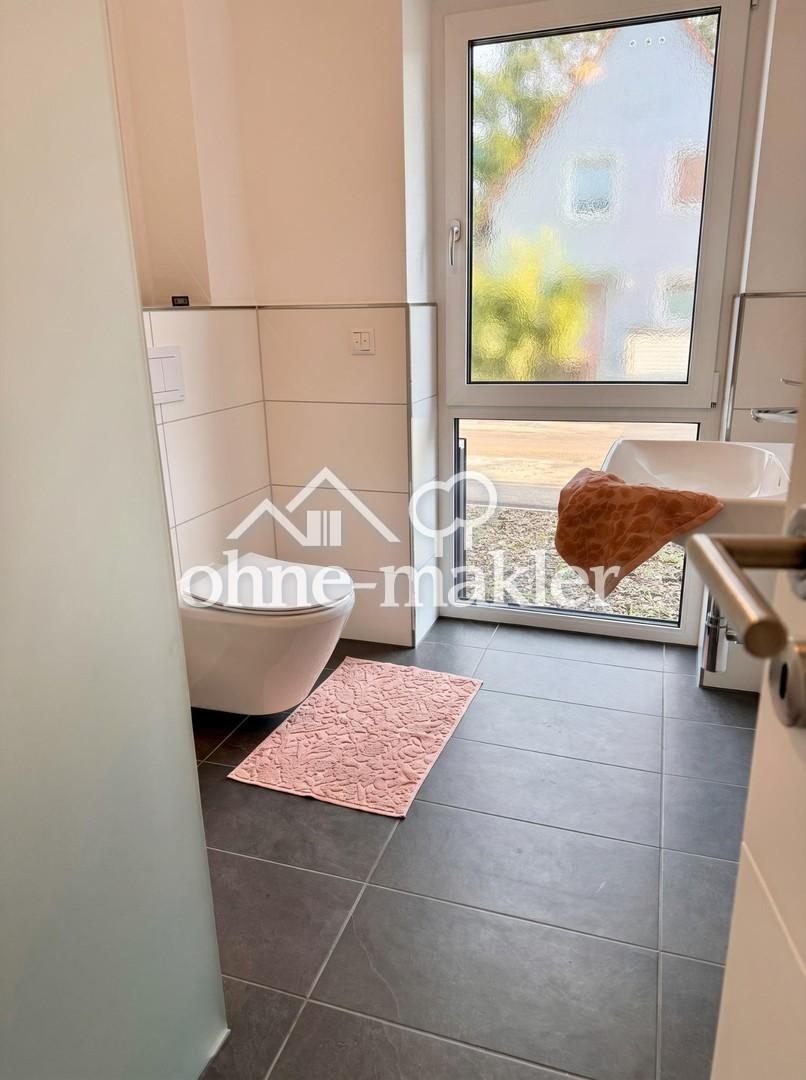 3-ZKB Erdgeschosswohnung mit Garten, Terrasse, EBK & 3 Stellplätzen - Foto 4