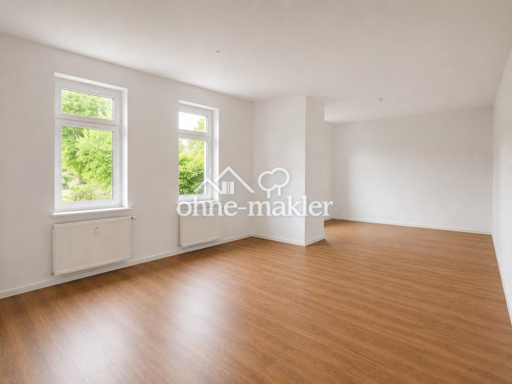 Großzügig sanierte 2 Zimmer Wohnung mit großer Wohnküche und Gartenblick - Photo 1