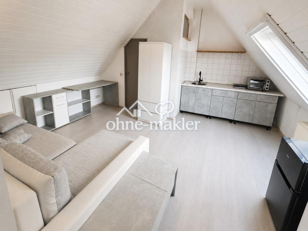 Kompaktes Dachgeschoss-Appartement mit neuer Nolte-Küche, Klima und Stellplatz - Photo 2