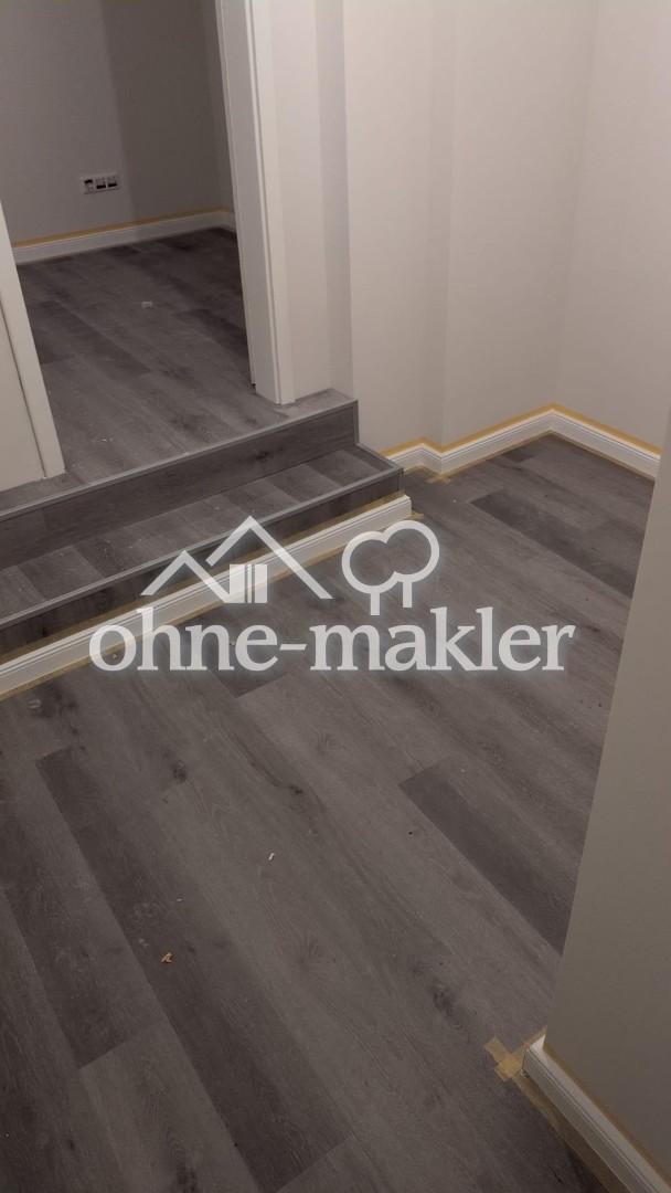Erstbezug! 2,5-Zi Wohnung in Toplage von Rüdesheim mit Einbauküche - Photo 2