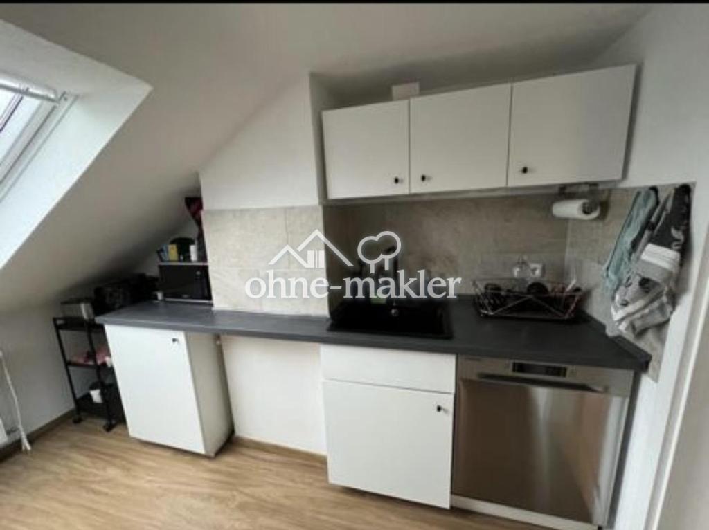 Helle 2-Zimmer-Dachgeschosswohnung in ruhiger Lage von Dortmund-Brackel - Foto 5