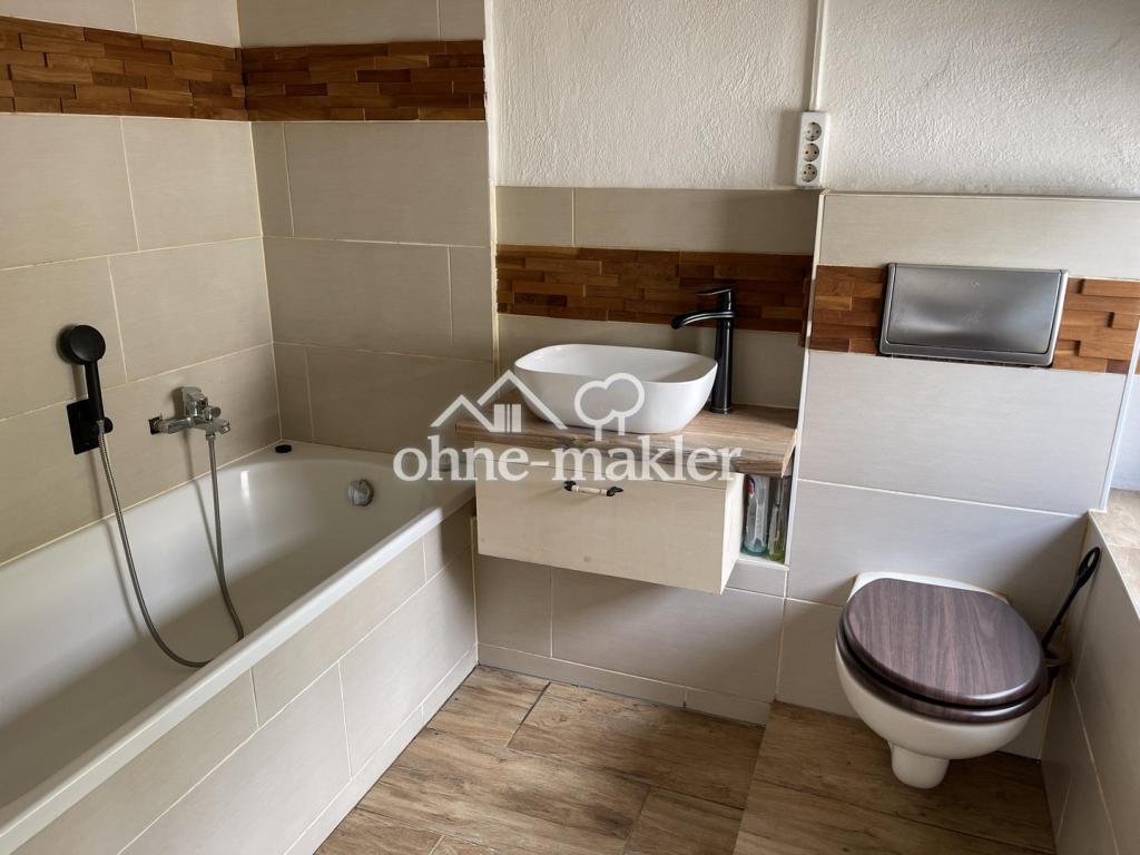 Kleines Haus mit Garten und Blick auf die Mulde - Photo 1