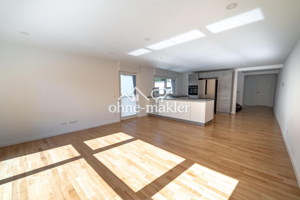 Exklusive Maisonettewohnung mit Haus-im-Haus-Charakter, Garten, Dachloggia, Garage in Pfaffendorf - Photo 1