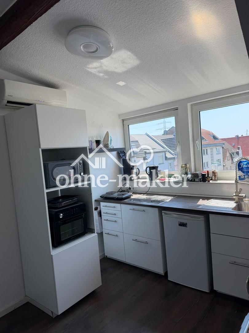 Nette 2 Zimmer Dachgeschosswohnung mit Klimaanlage - Foto 4
