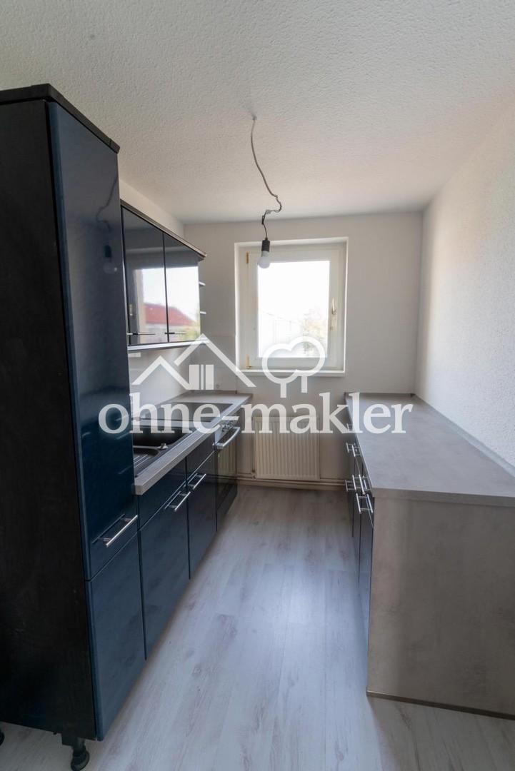 gepflegte 3-Zimmerwohnung mit Balkon, EBK und Stellplatz in Nienburg (Saale) - Foto 2