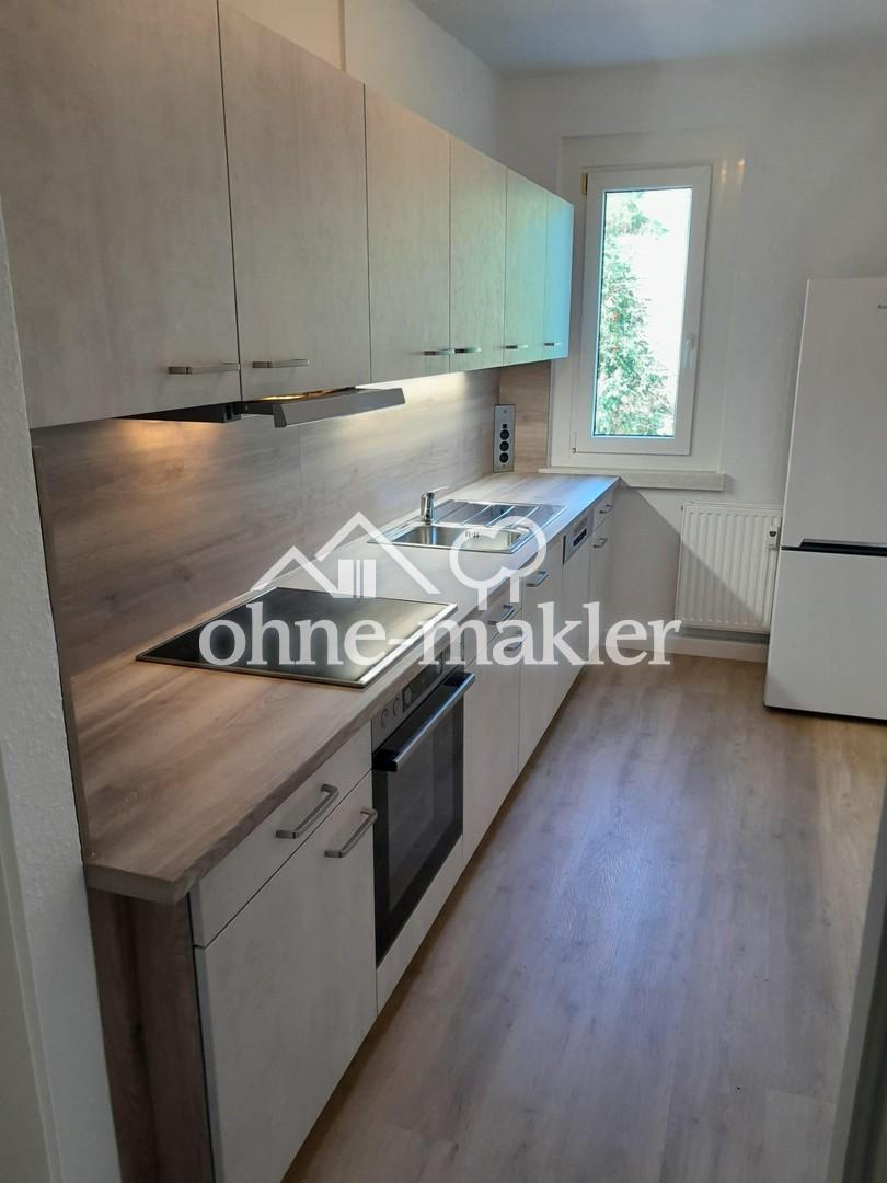 Elterlein: Sonnige 3-Zimmer-Wohnung mit großem Balkon und Einbauküche in ruhiger Neubauanlage - Photo 1