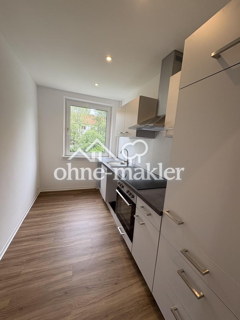 Frisch renovierte 3-Raum Wohnung mit Einbauküche und Balkon - Foto 1