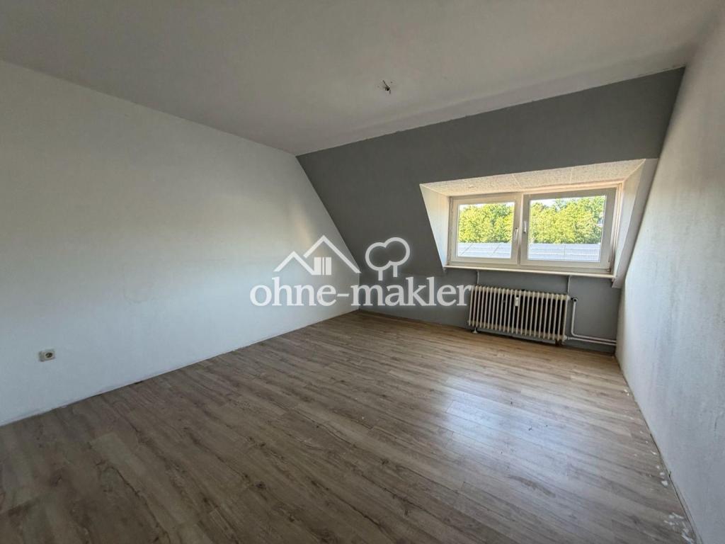 Moderne & lichtdurchflutete 3-Zimmer-Dachgeschosswohnung in zentraler Lage von Menden - Foto 1