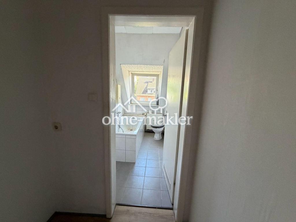 Moderne & lichtdurchflutete 3-Zimmer-Dachgeschosswohnung in zentraler Lage von Menden - Foto 3