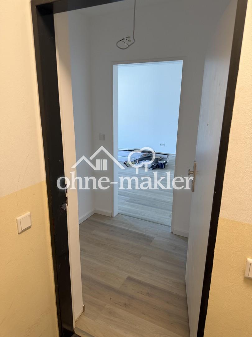 2-Zimmer EG-Wohnung mit Balkon kernsaniert 63qm - Foto 3