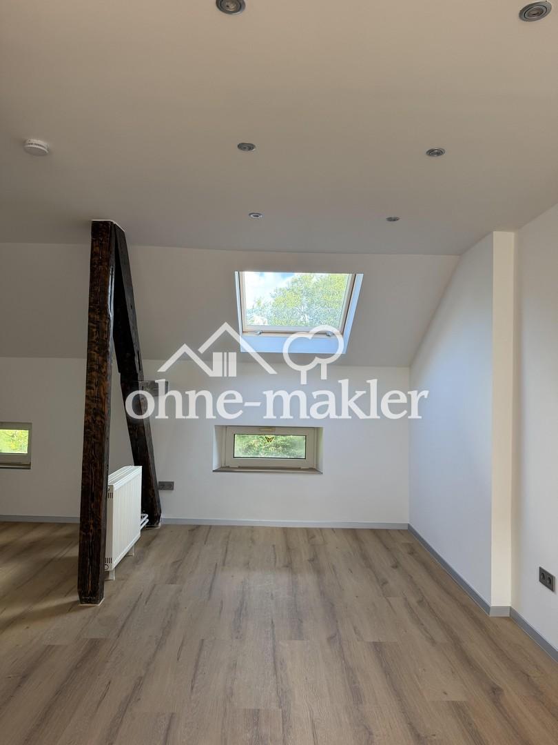 Schöne 2 Zimmer Dachgeschosswohnung - Foto 4