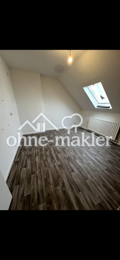 ruhige und gepflegte Dachgeschoss-Wohnung in zentraler Lage - Photo 4
