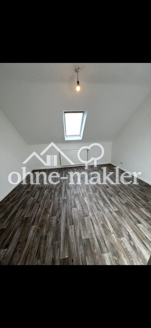 ruhige und gepflegte Dachgeschoss-Wohnung in zentraler Lage - Photo 3