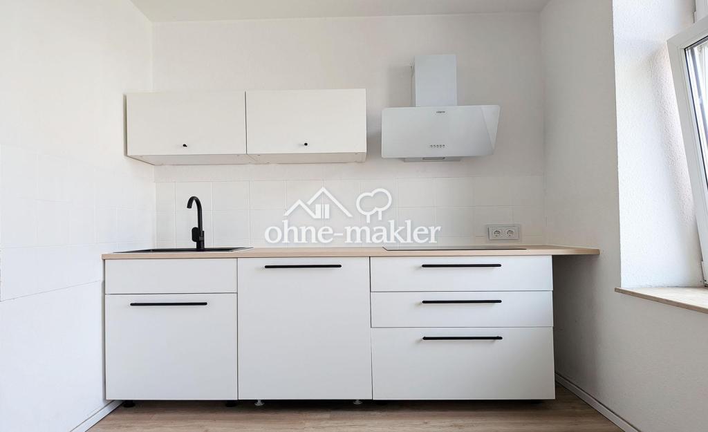 Geringe Heizkosten: Modernisiertes Apartment mit Einbauküche & neuem Badezimmer - Foto 4