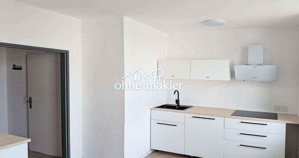 Geringe Heizkosten: Modernisiertes Apartment mit Einbauküche & neuem Badezimmer - Foto 3