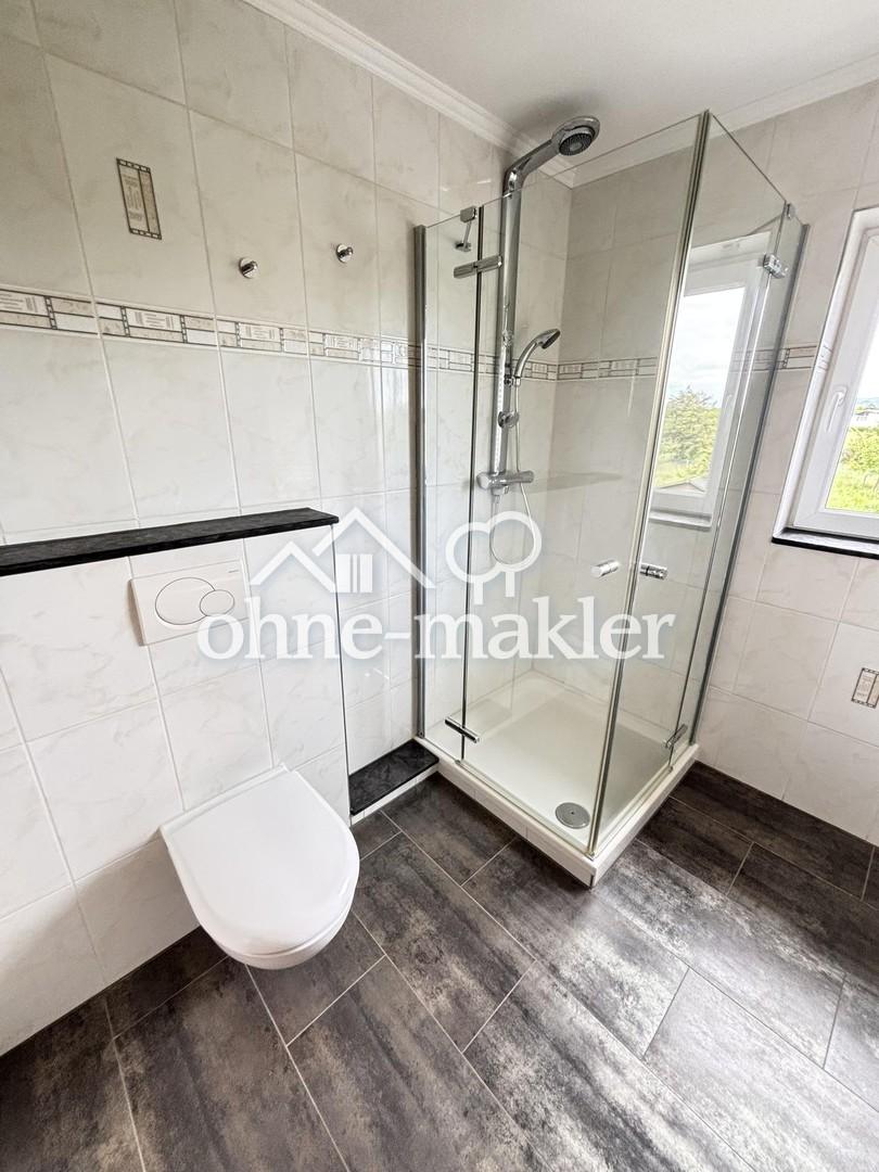 Charmante OG-Wohnung mit Balkon, hochwertiger Einbauküche und Parkplätzen - Photo 5