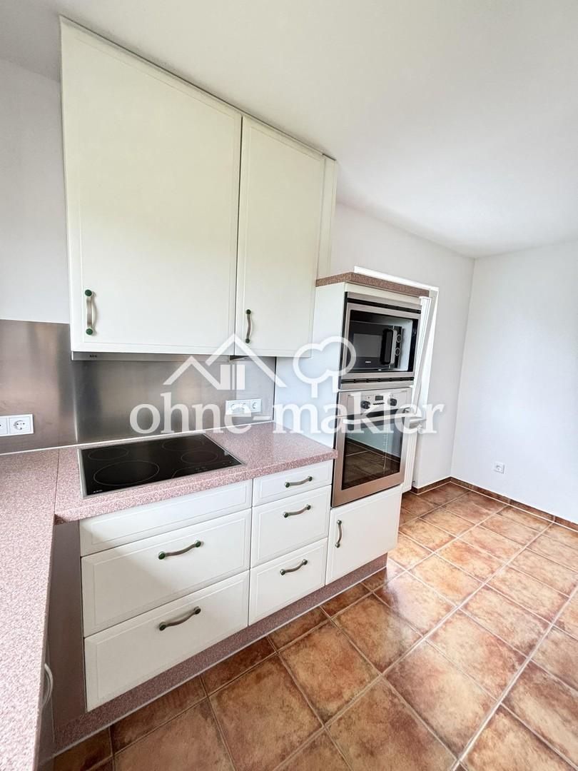 Charmante OG-Wohnung mit Balkon, hochwertiger Einbauküche und Parkplätzen - Foto 5