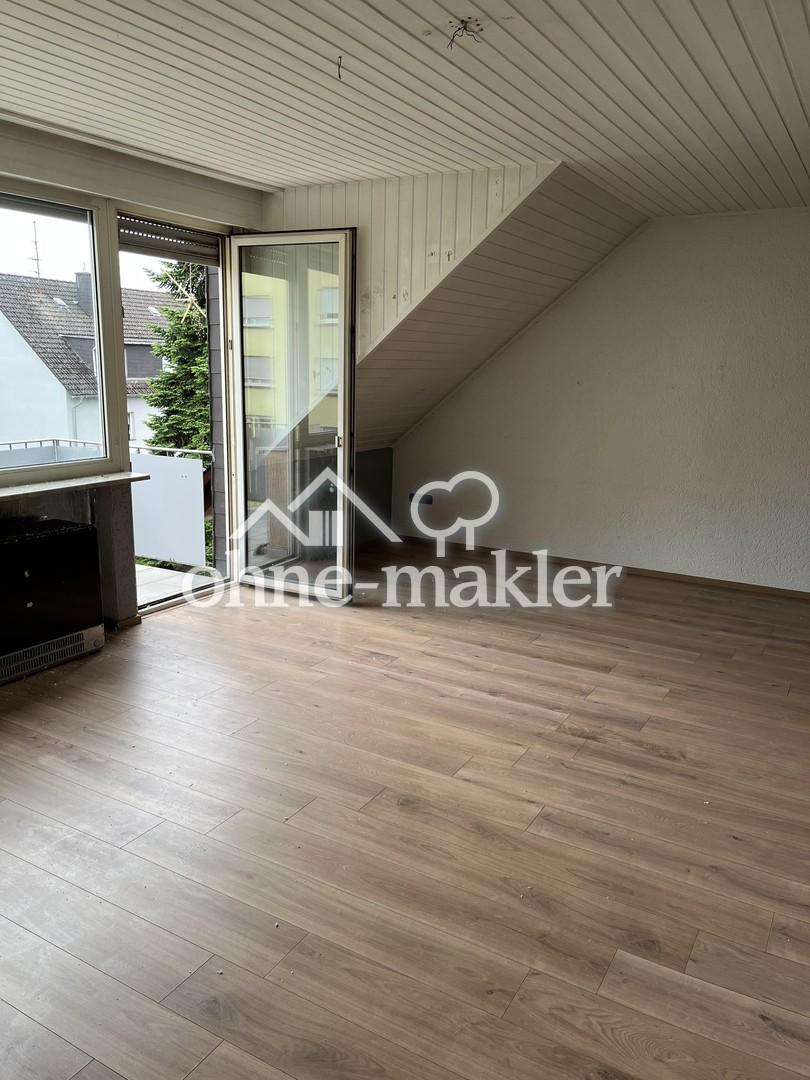 Helle 2-ZKB-Dachgeschosswohnung mit Balkon und Stellplatz in Trier-Pfalzel - Photo 1