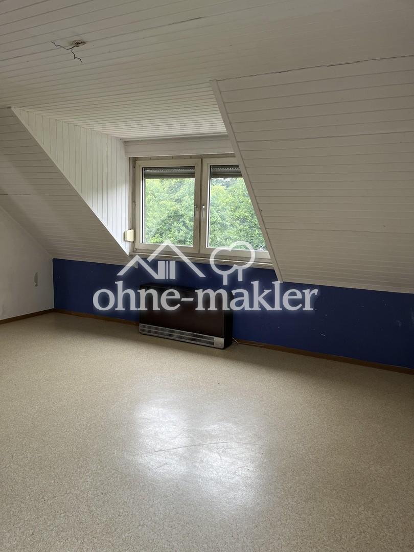 Helle 2-ZKB-Dachgeschosswohnung mit Balkon und Stellplatz in Trier-Pfalzel - Foto 5