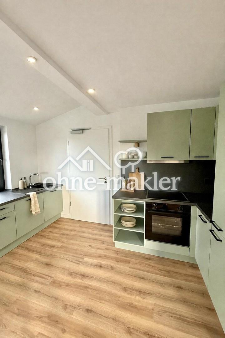 Erstbezug: Modernes Dachgeschoss-Appartement mit Küche, Klimaanlage und Fußbodenheizung - Foto 4
