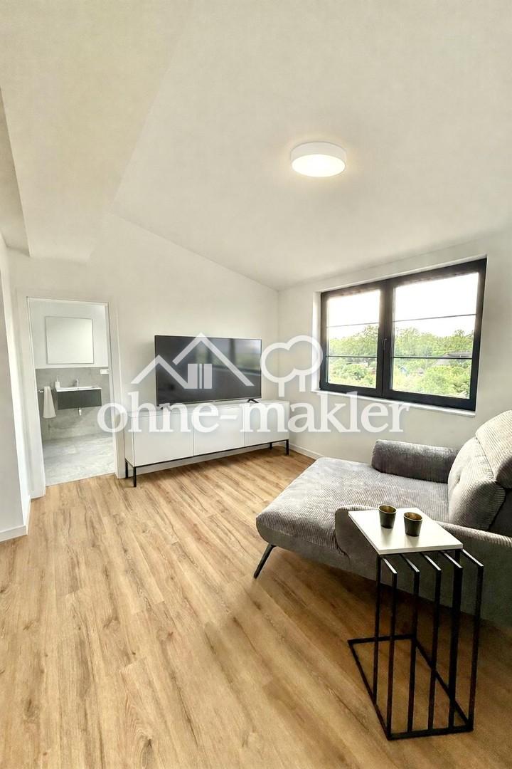 Erstbezug: Modernes Dachgeschoss-Appartement mit Küche, Klimaanlage und Fußbodenheizung - Foto 1