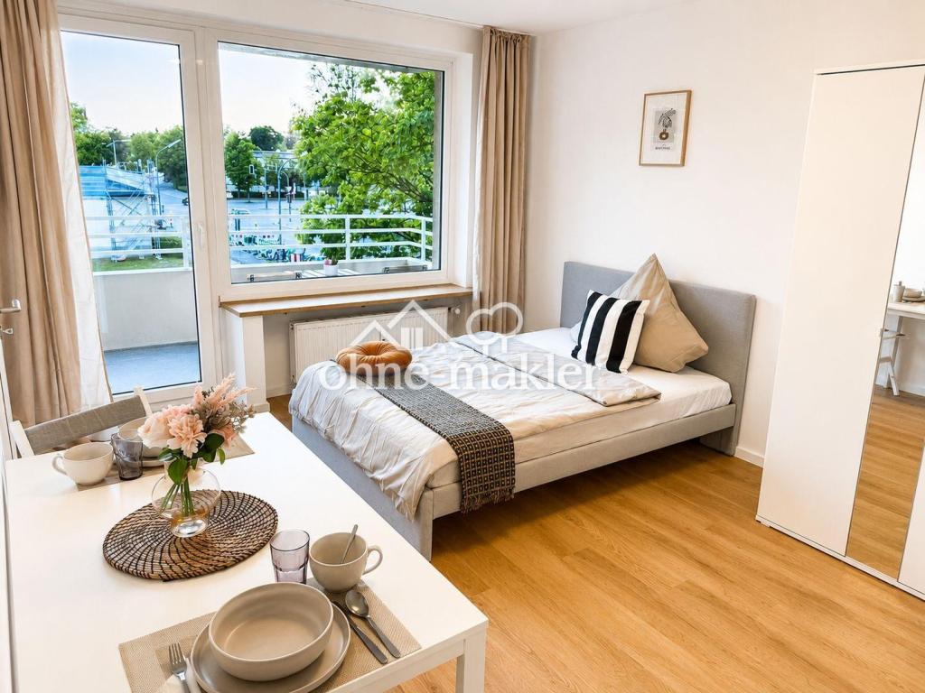 Erstbezug nach Sanierung – Modern möbliertes 1-Zimmer-Apartment mit Balkon in Top-Lage - Foto 2