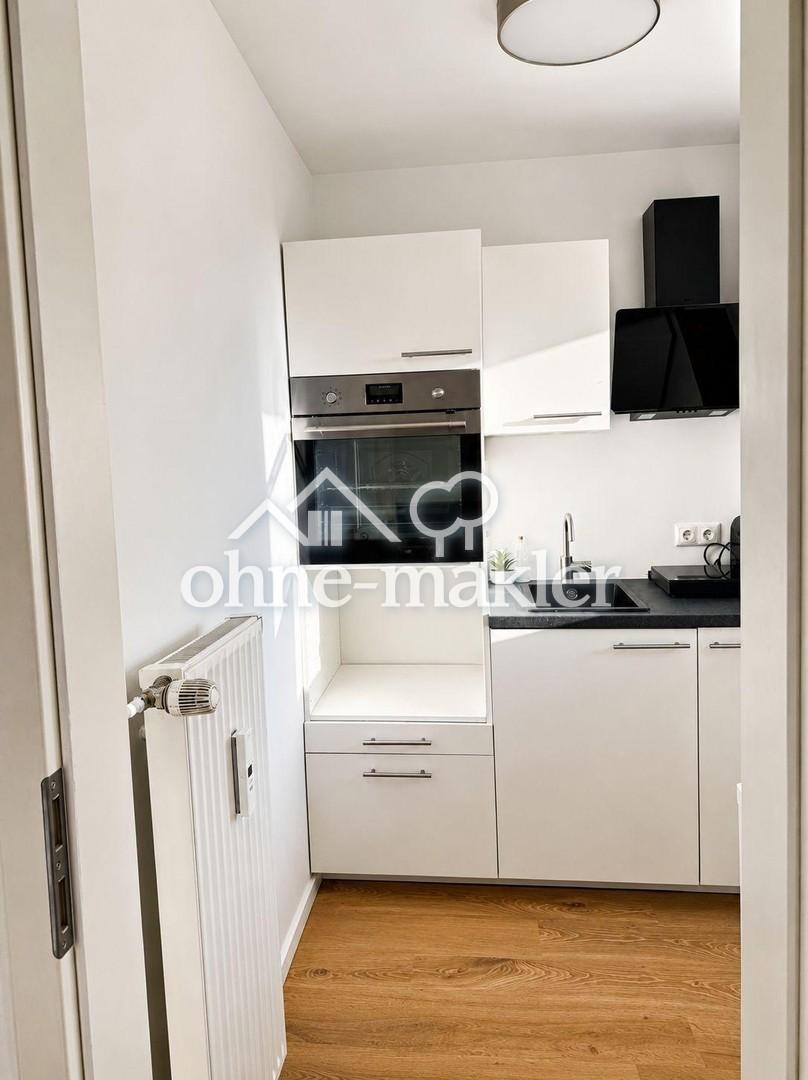 Erstbezug nach Sanierung – Modern möbliertes 1-Zimmer-Apartment mit Balkon in Top-Lage - Foto 4