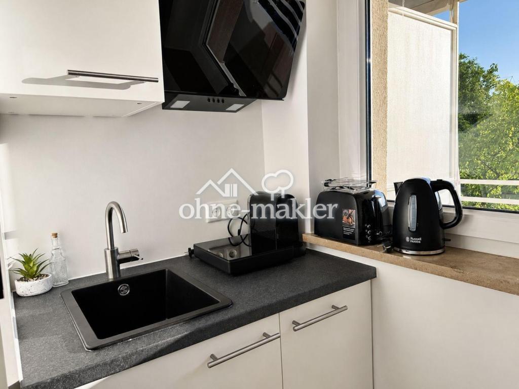Erstbezug nach Sanierung – Modern möbliertes 1-Zimmer-Apartment mit Balkon in Top-Lage - Foto 5