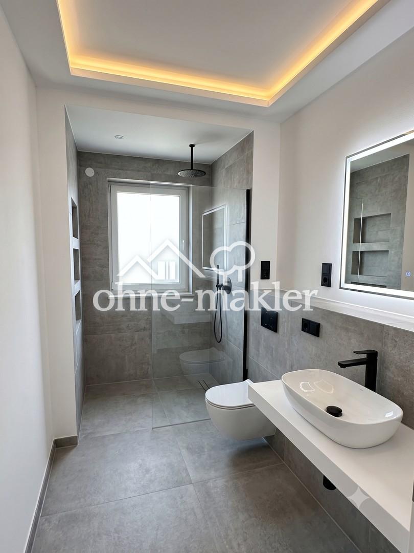 Exklusiver Erstbezug 2-Zimmer-Wohnung mit Klimaanlage, Einbauküche und Balkon in Berlin-Spandau - Photo 4