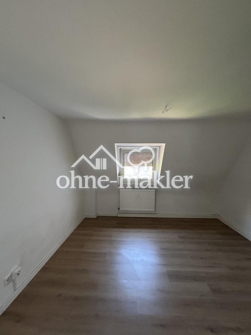 Helle 4-Zimmer-Dachgeschosswohnung mit großzügiger Küche - Foto 4
