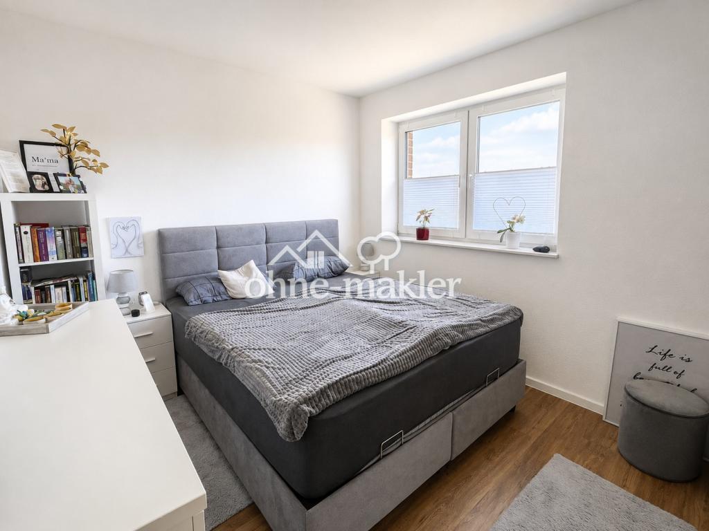 Moderne 4-Zimmer-Maisonettewohnung mit Balkon im energieeffizienten QNG-Neubau - Foto 4