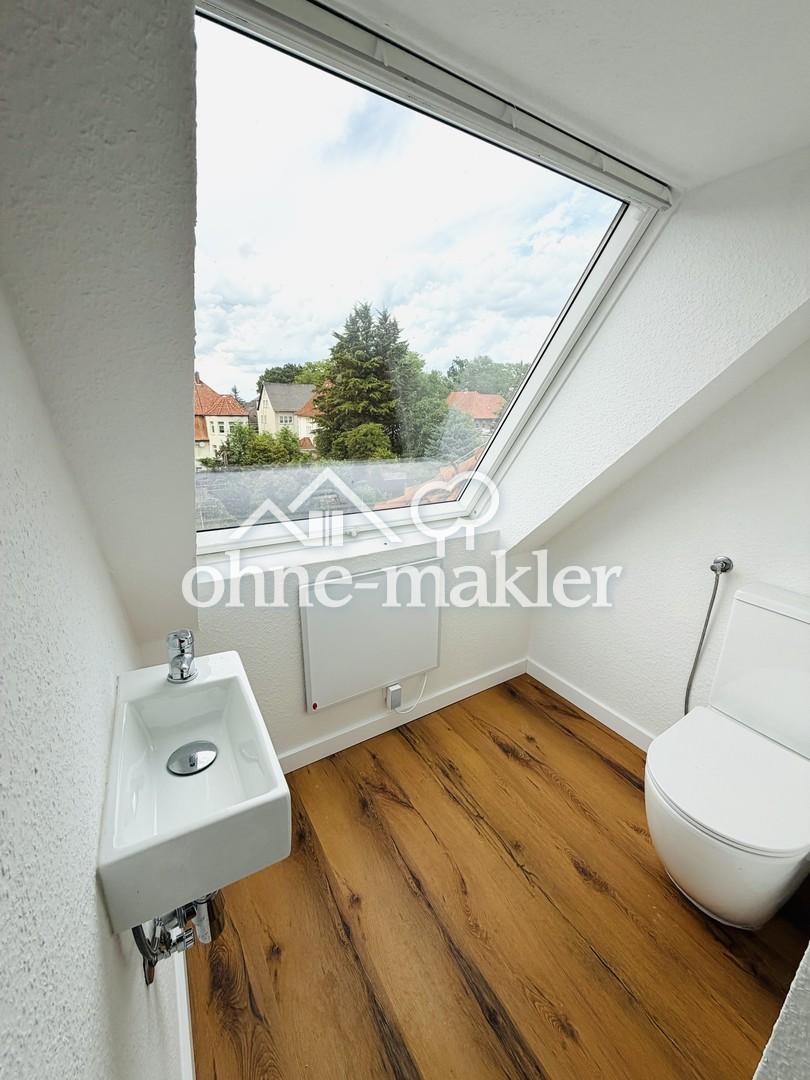 Exklusives Wohnen am Stadthäger Wall: Frisch sanierte Doppelhaushälfte mit großem Garten & 2 Garagen - Foto 5