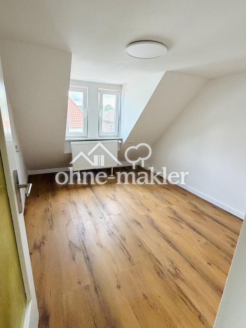 Exklusives Wohnen am Stadthäger Wall: Frisch sanierte Doppelhaushälfte mit großem Garten & 2 Garagen - Foto 3