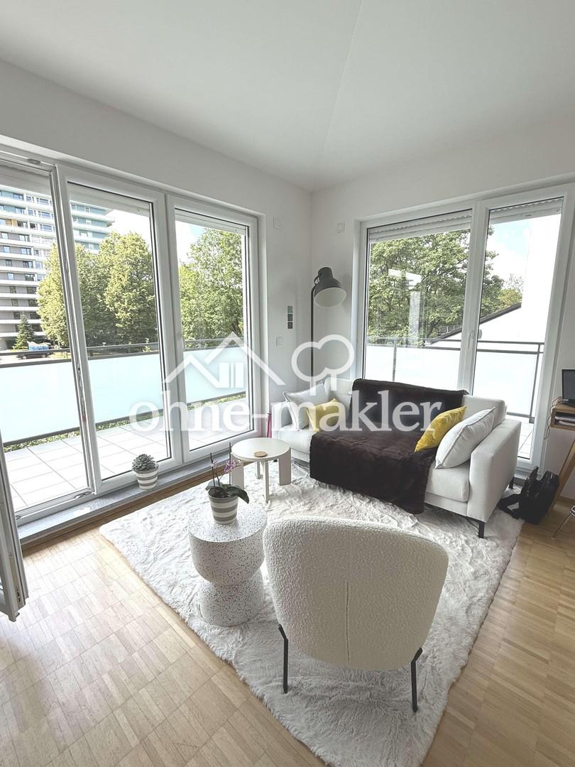 Exklusive 2-Zimmer-Dachgeschosswohnung mit umlaufender Dachterrasse in München-Bogenhausen - Foto 2