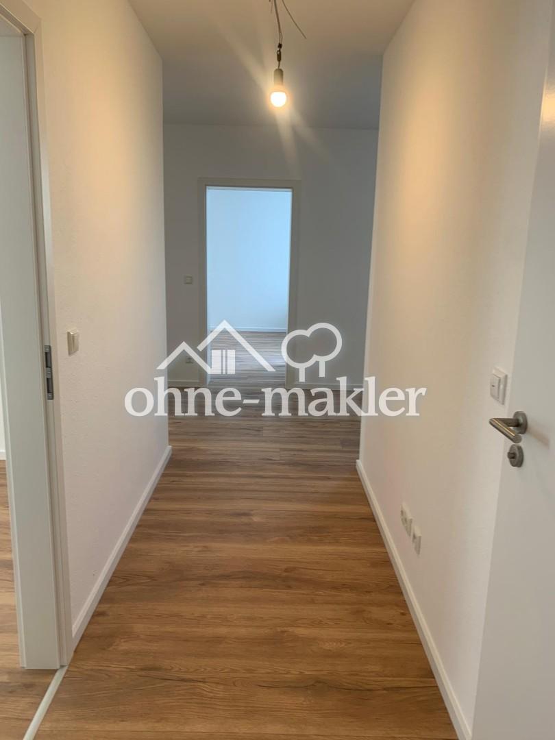 Erstbezug nach Sanierung: Helle 2,5-Zimmer-Wohnung mit Weitblick, Aufzug & TG in Heusenstamm - Photo 5