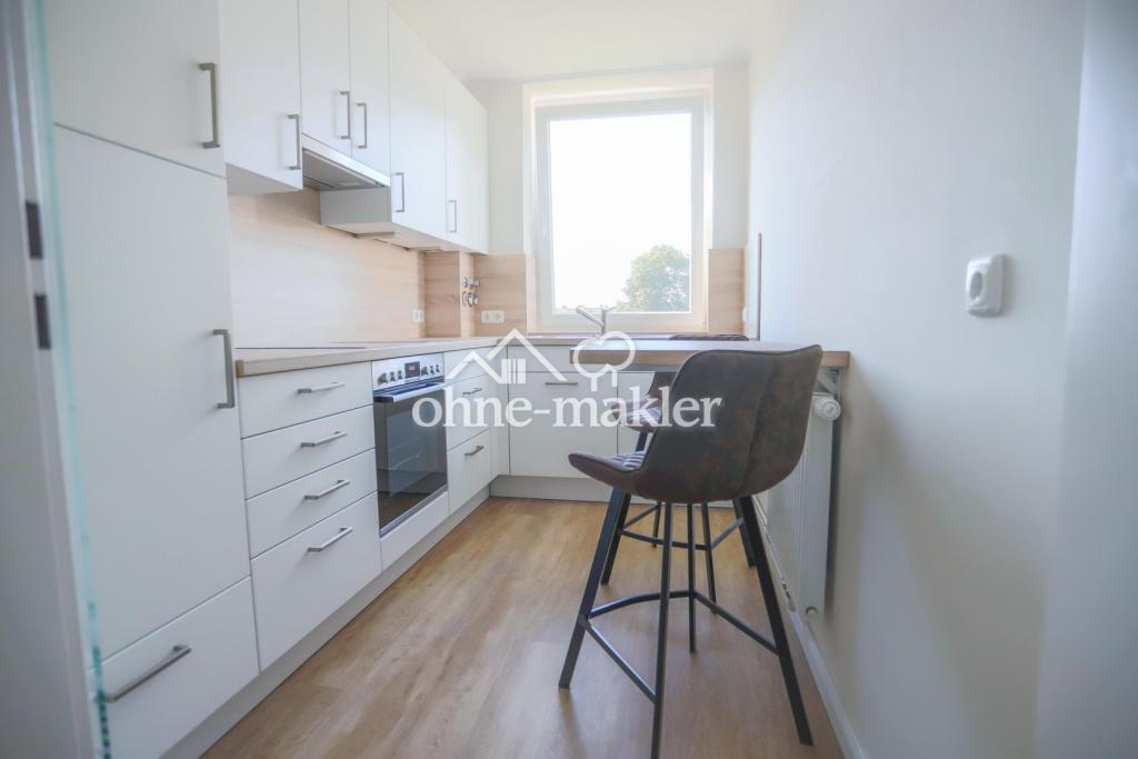 Frisch renoviert & neuwertig: Charmante 2-Zimmer-Wohnung mit Loggia in Barmstedt - Foto 3