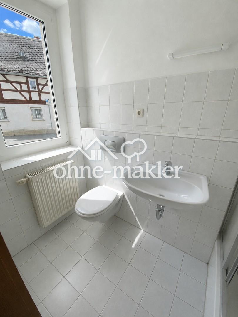 Frisch renovierte 2-Zimmer-Erdgeschosswohnung in Langenbernsdorf – frei ab September - Foto 2