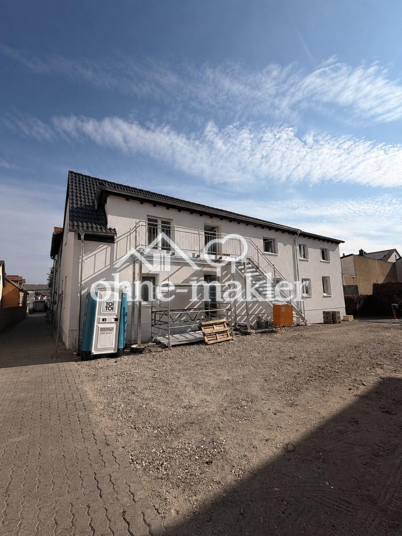 Luftige Dachwohnung mit Loft-Stil nach Kernsanierung: 2 Zimmer + Ankleide & Balkon - Photo 4