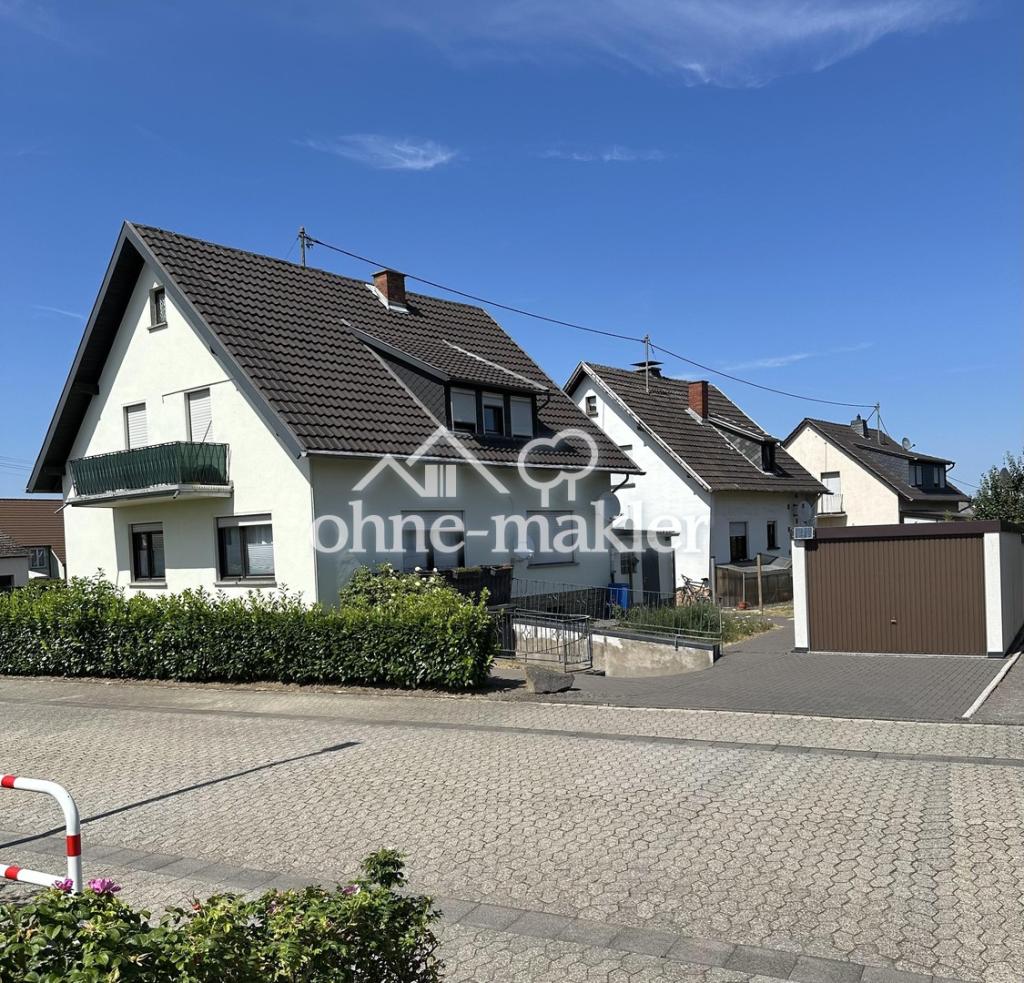 Gemütliche 3-Zimmer-Erdgeschosswohnung mit Garten und Carport in Niederlützingen - Photo 1