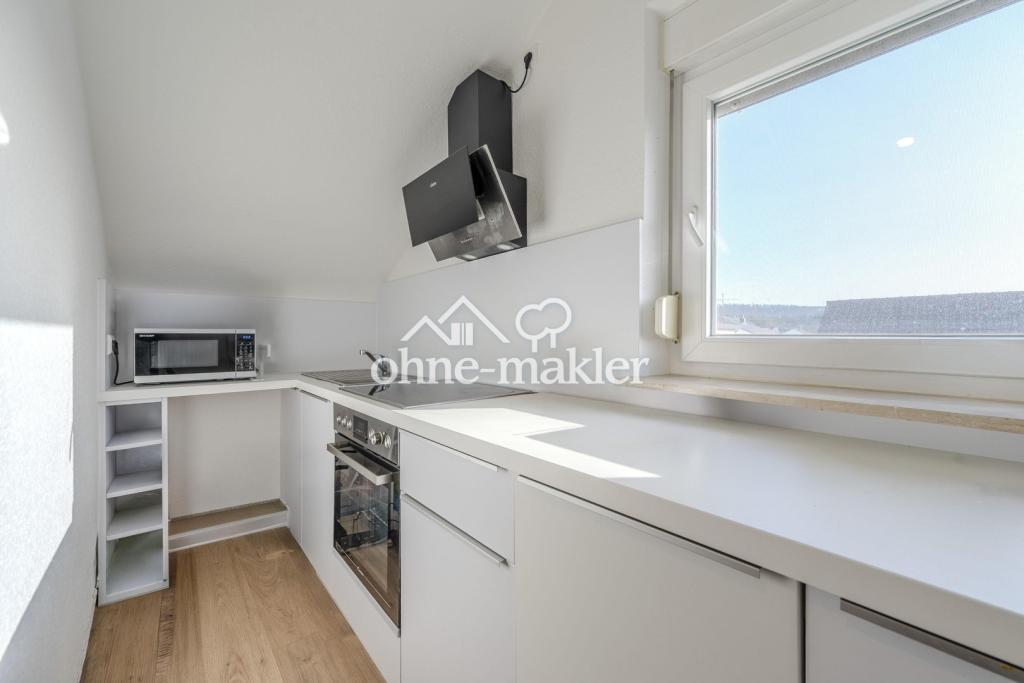 Kernsanierte 2-Zimmer-Dachgeschosswohnung mit neuer Einbauküche & Stellplatz in Oberstenfeld - Photo 3