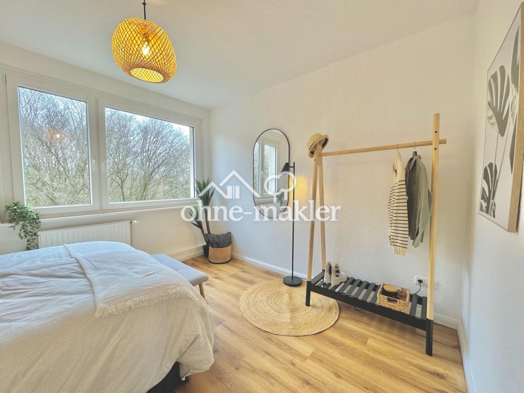 Kernsanierte 3-Zimmer-Wohnung mit Balkon, Einbauküche und Grünblick in Bremen-Woltmershausen - Photo 4
