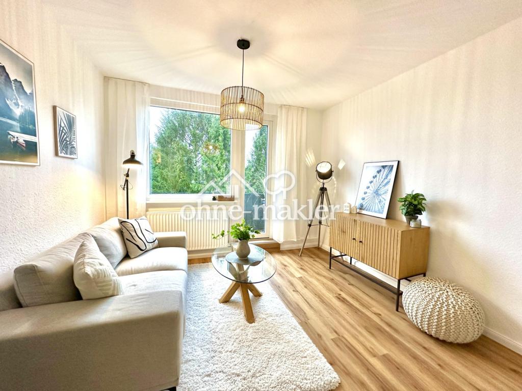 Kernsanierte 3-Zimmer-Wohnung mit Balkon, Einbauküche und Grünblick in Bremen-Woltmershausen - Photo 2