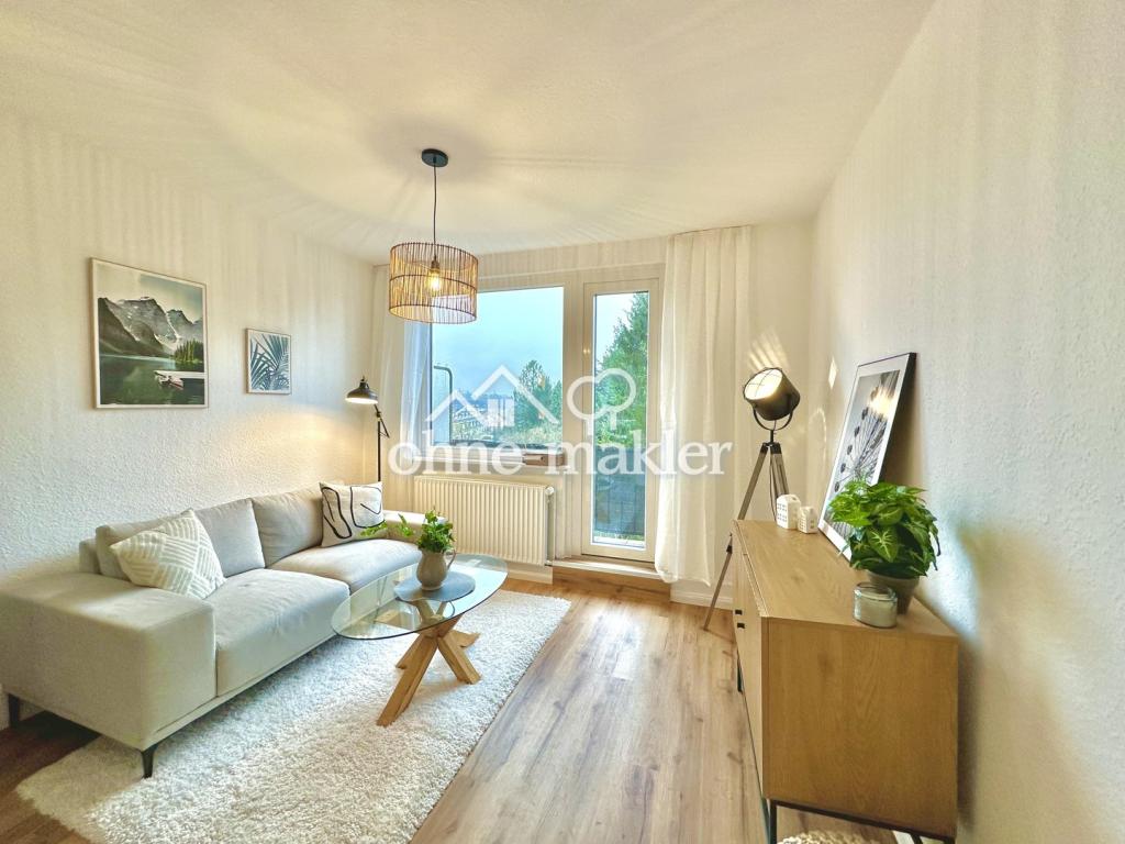 Kernsanierte 3-Zimmer-Wohnung mit Balkon, Einbauküche und Grünblick in Bremen-Woltmershausen - Photo 1