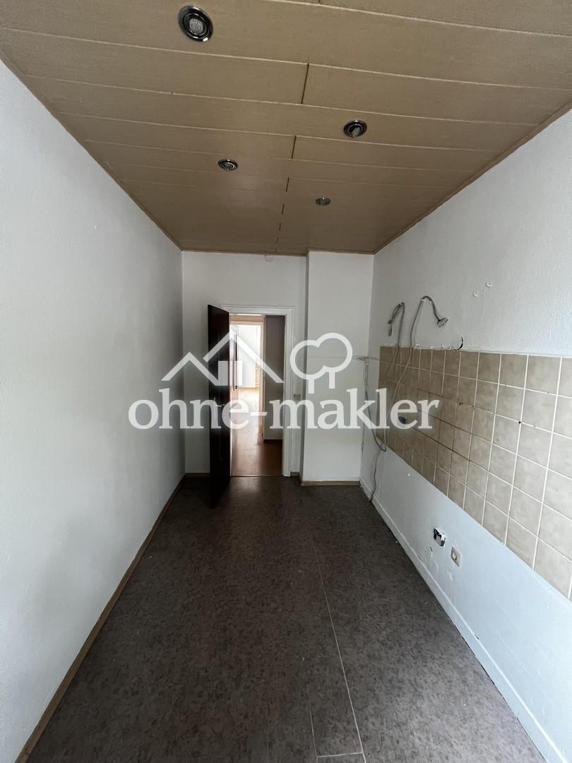 Frisch gestrichene 3-Zimmer-Wohnung mit Balkon am Burbacher Markt – provisionsfrei - Foto 2