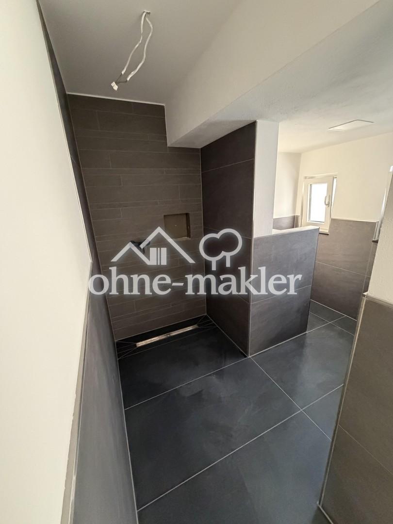 Ländliche Ruhe trifft moderne Eleganz-Exklusive Neubauwohnung im Erdgeschoss - Foto 3