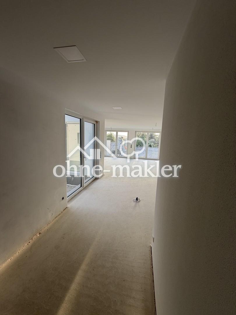 Ländliche Ruhe trifft moderne Eleganz-Exklusive Neubauwohnung im Erdgeschoss - Foto 5